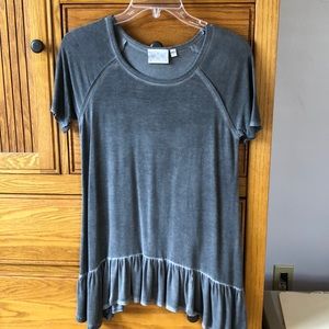 S gray shirt with ruffles on bottom